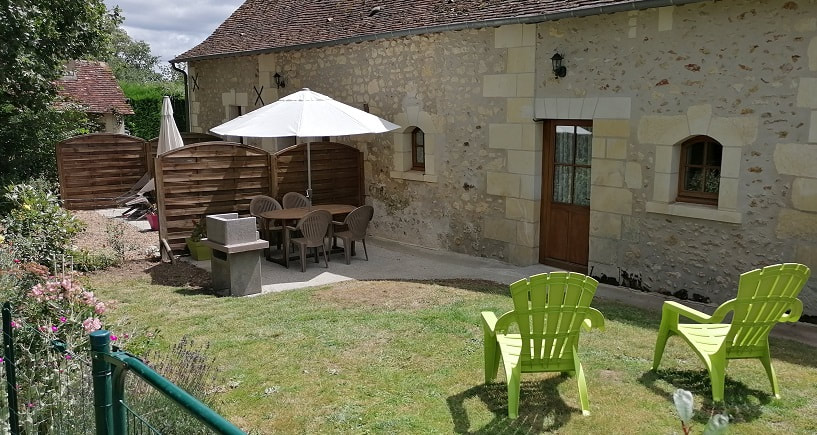 Gite #2 Le Martinet: Rear terrace and barbecue  at Gites de La Richardiere.